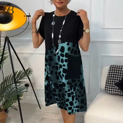 Printed Short Sleeve Dress with Round Neck and Animal Pattern Black/Gray Apparel & Accessories > Clothing > Dresses